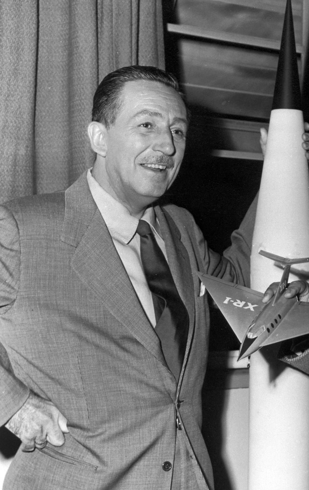 Walt Disney with Wernher von Braun and a model rocket, 1954
